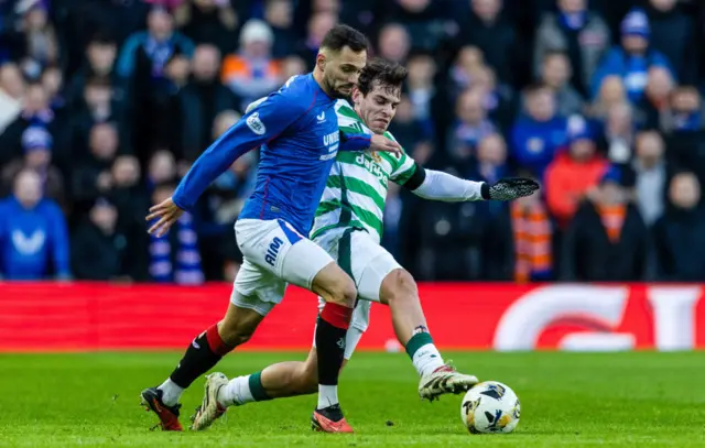 GLASGOW, SCOTLAND - JANUARY 02: Rangers' Nedim Bajrami (L) and Celtic's Paulo Bernardo in action during a William Hill Premiership match between Rangers and Celtic at Ibrox Stadium, on January 02, 2025, in Glasgow, Scotland.  (Photo by Craig Foy / SNS Group)