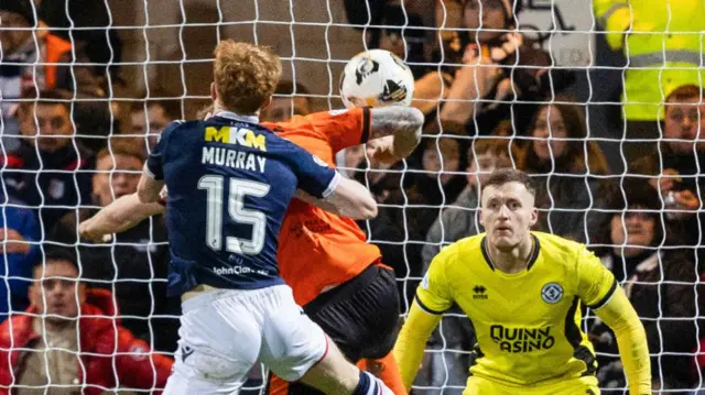 DUNDEE, SCOTLAND - JANUARY 02: Dundee are awarded a penalty after the ball hits the arm of Dundee United's Kevin Holt following a VAR check during a William Hill Premiership match between Dundee and Dundee United at the Scot Foam Stadium at Dens Park, on January 02, 2025, in Dundee, Scotland.  (Photo by Ross Parker / SNS Group)