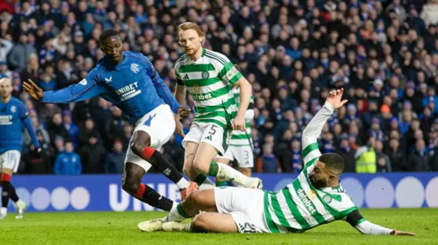 GLASGOW, SCOTLAND - JANUARY 02: Celtic's Cameron Carter-Vickers and Rangers' Mohamed Diomande in action during a William Hill Premiership match between Rangers and Celtic at Ibrox Stadium, on January 02, 2025, in Glasgow, Scotland.  (Photo by Craig Williamson / SNS Group)