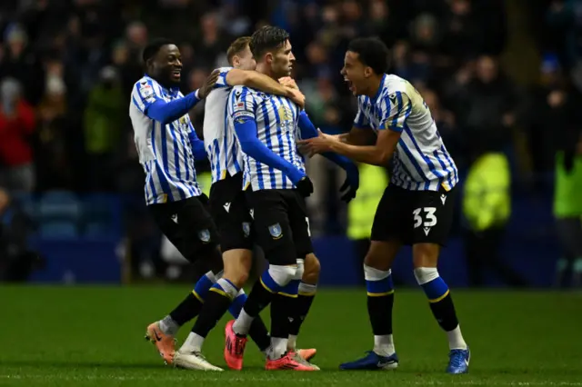 Josh Windass celebrating with Sheffield Wednesday team-mates