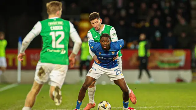 Hibernian's Chris Cadden and Nectario Triantis and St Johnstone's Benjamin Kimpioka