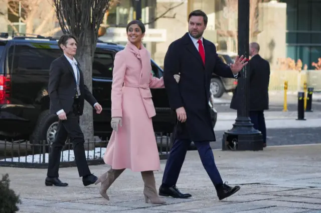 JD Vance and Usha Vance arrive at St John's Church, waving