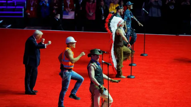 U.S. President-elect Donald Trump dances onstage as the Village People perform during a rally the day before he is scheduled to be inaugurated for a second term, in Washington, U.S., January 19, 2025