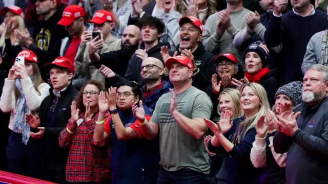 Attendees cheer inside Capital One arena as Donald Trump is sworn in as the U.S President on the inauguration day of his second Presidential term, in Washington