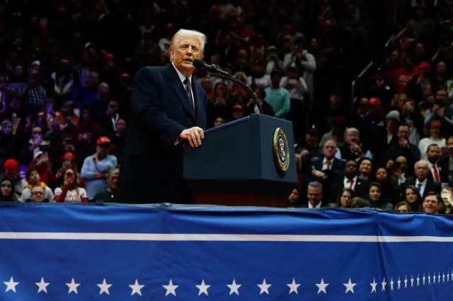 Trump speaks from a podium