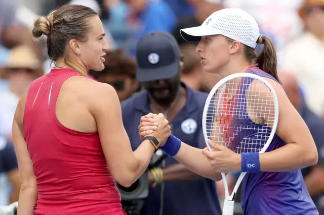 Aryna Sabalenka of Belarus is congratulated by Iga Swiatek of Poland