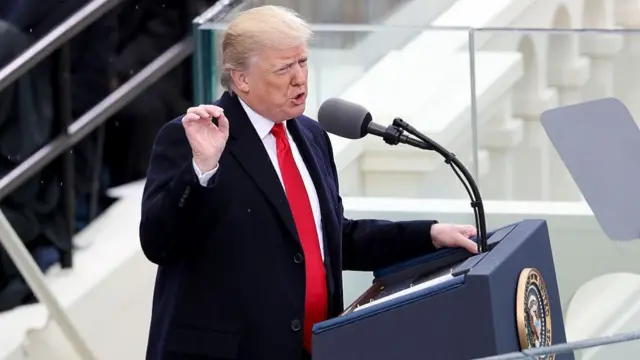 Trump speaks from a podium