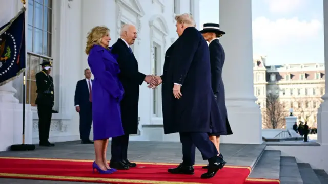 US President Joe Biden and First Lady Jill Biden greet President-elect Donald Trump and Melania Trump as they arrive at the White House