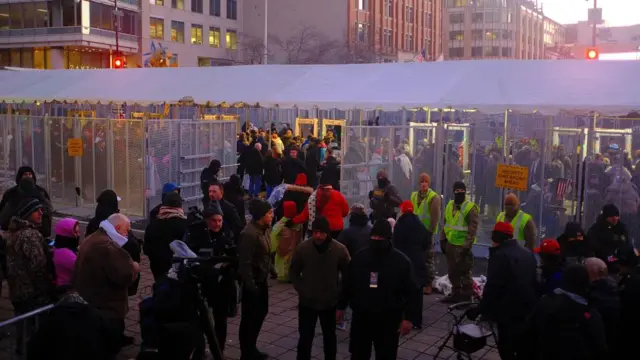 People line up in front of Capital One Arena ahead of Trump's inauguration viewing, in Washington, DC, USA, 20 January 2025. Trump will be sworn in for a second term as president of the United States on 20 January. The presidential inauguration will be held indoors due to extreme cold temperatures in DC