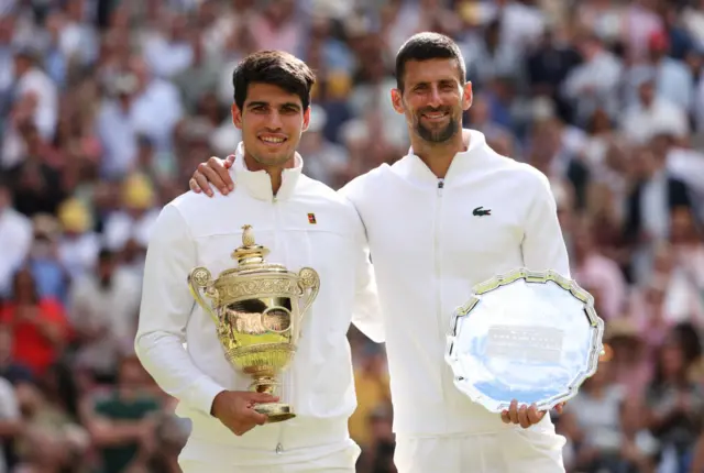 Carlos Alcaraz and Novak Djokovic after the 2024 Wimbledon final