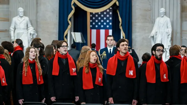 A choir has been rehearsing ahead of Trump's arrival