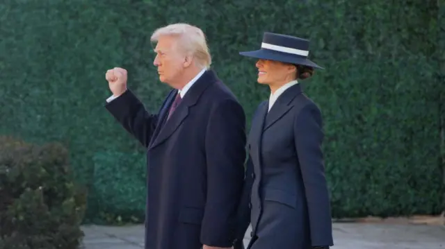 U.S. President-elect Donald Trump and his wife Melania Trump walk after attending a service at St. John's Church on Inauguration Day of Donald Trump's second presidential term in Washington, U.S. January 20, 2025.