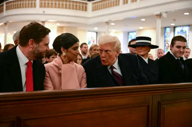 US President-elect Donald Trump speaks with Vice President-elect JD Vance (L) and Usha Vance (2nd L) during a church service at St. John's Episcopal Church, Lafayette Square