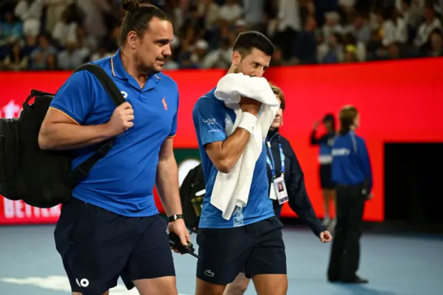 Djokovic walks off court