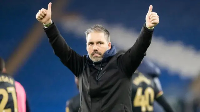 QPR boss Marti Cifuentes gives the thumbs-up to supporters