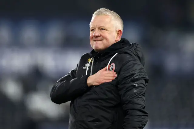 Chris Wilder beats his chest after Sheff Utd win at Swansea