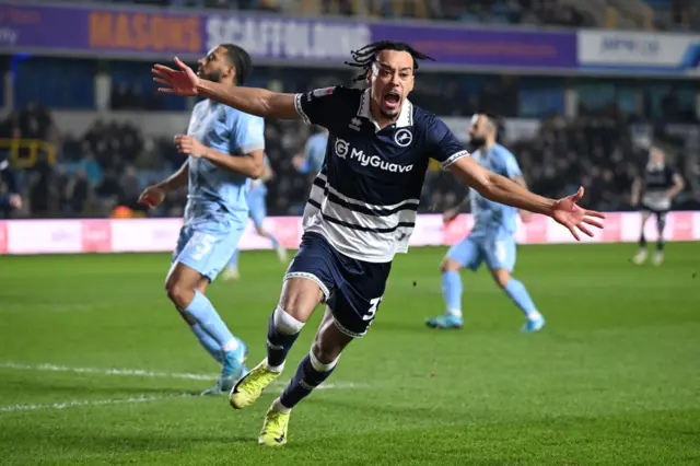 Calum Scanlon of Millwall celebrates