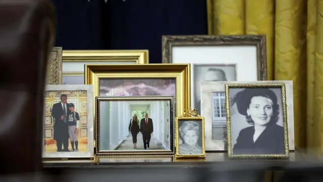 Donald Trump's family photos are displayed in the Oval Office.