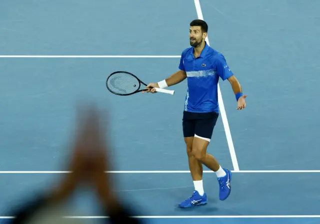 Djokovic motions to the crowd