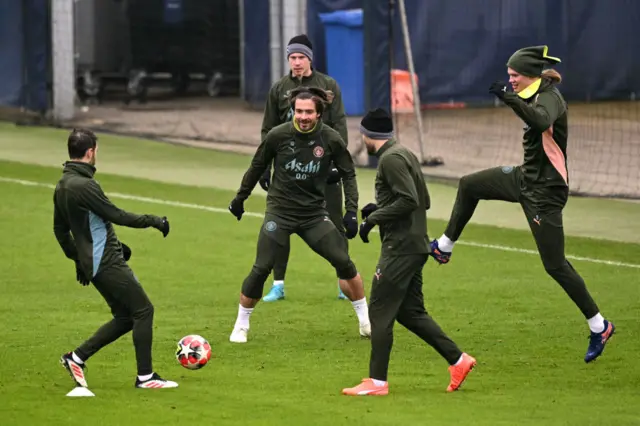 Manchester City players train