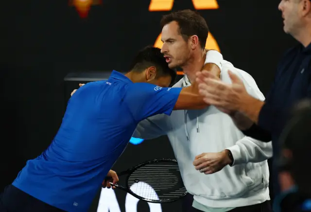 Djokovic hugs Andy Murray