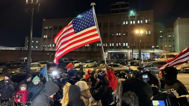 6 January defendant supporters outside the DC jail