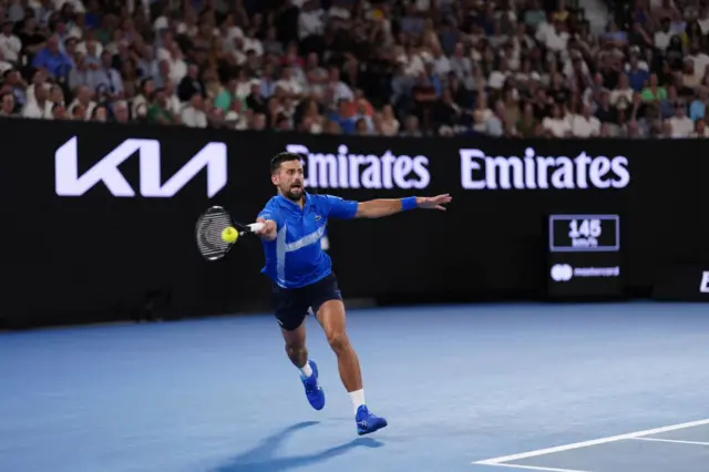 Novak Djokovic reaches for a forehand