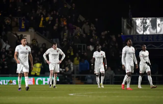 Luton Town players appear dejected