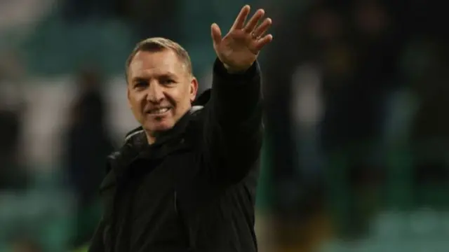 Celtic manager Brendan Rodgers waves to fans