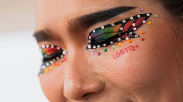 A SWING foundation staff with face painting is pictured during the 2024 Pattaya Community Pride Parade.