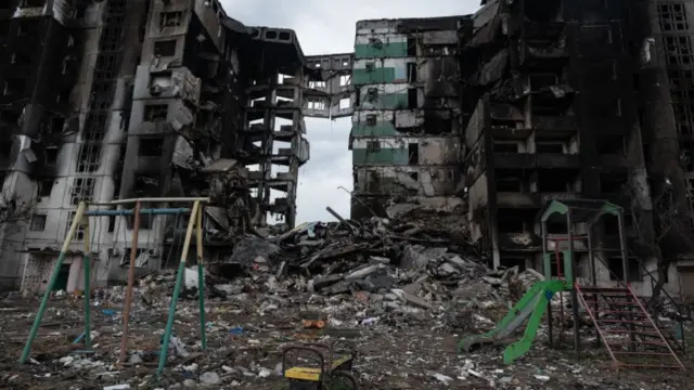 A playground is seen next to a destroyed apartment building on April 9, 2022 in Borodianka, Ukraine.