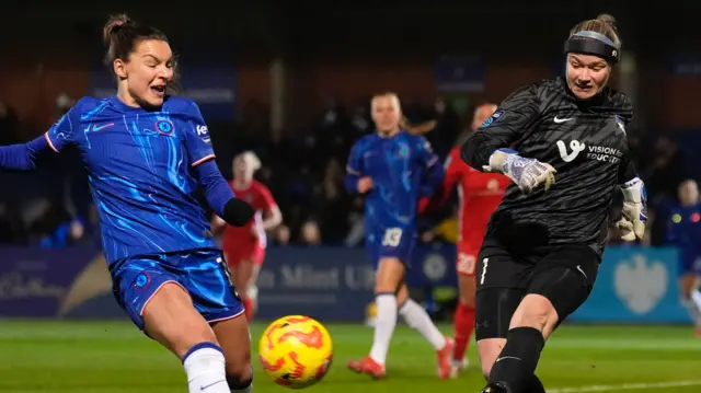 Durham goalkeeper Tatiana Saunders clears the ball away from Chelsea's Johanna Rytting Kaneryd during the Subway Women's League Cup quarter-final match