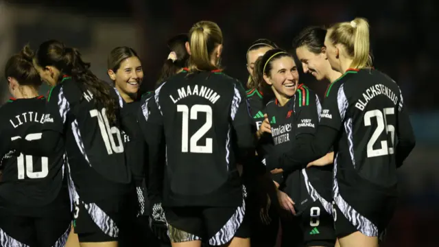 Mariona Caldentey of Arsenal celebrates scoring her team's fourth goal with teammates during the Subway Women's League Cup match between Brighton & Hove Albion and Arsenal