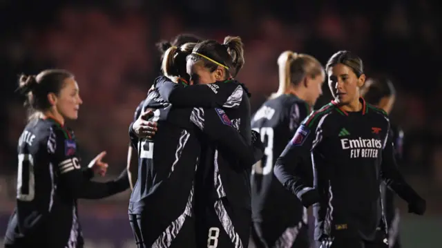 Frida Maanum of Arsenal celebrates scoring her team's first goal with teammate Mariona Caldentey during the Subway Women's League Cup match between Brighton & Hove Albion and Arsenal