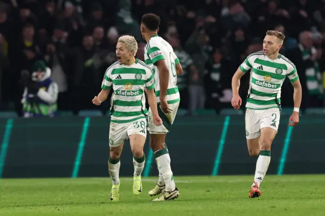 Daizen Maeda celebrates with Celtic teammates