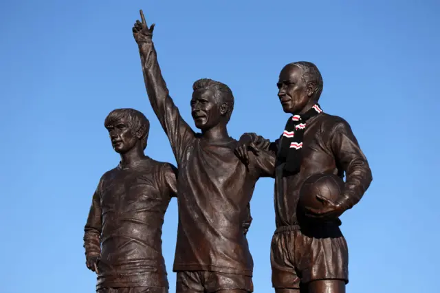 Statue of George Best, Denis Law and Bobby Charlton