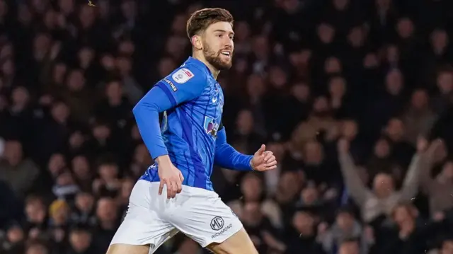 Callum Lang celebrates scoring