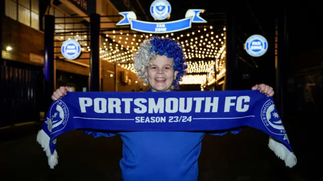 Portsmouth fan with a scarf