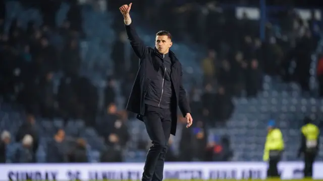 Portsmouth manager John Mousinho celebrates after the 3-1 win over Stoke