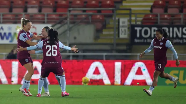 Kirsty Smith of West Ham United celebrates scoring her team's second goal during the Subway Women's League Cup match between Tottenham Hotspur and West Ham United