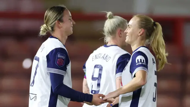 Martha Thomas of Tottenham Hotspur celebrates scoring her team's first goal with Molly Bartrip during the Subway Women's League Cup match between Tottenham Hotspur and West Ham United