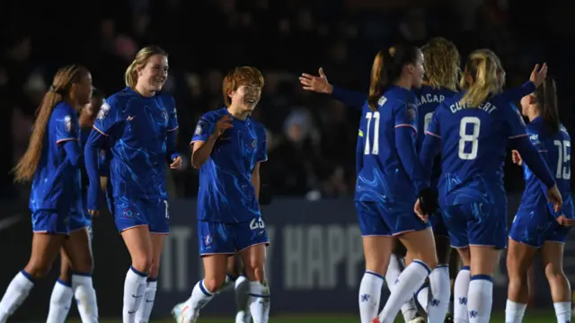 Maika Hamano of Chelsea celebrates with teammates after scoring her team's fifth goal during the Subway Women's League Cup match between Chelsea and Durham