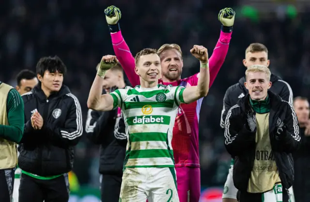 Alistair Johnston and Kasper Schmeichel celebrate