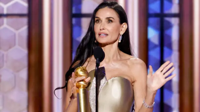 Demi Moore winning her Golden Globe award earlier this month