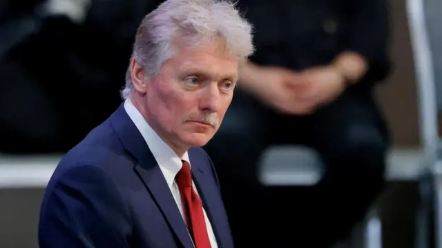 Kremlin spokesman Dmitry Peskov attends Russian President Vladimir Putin's annual end-of-year press conference