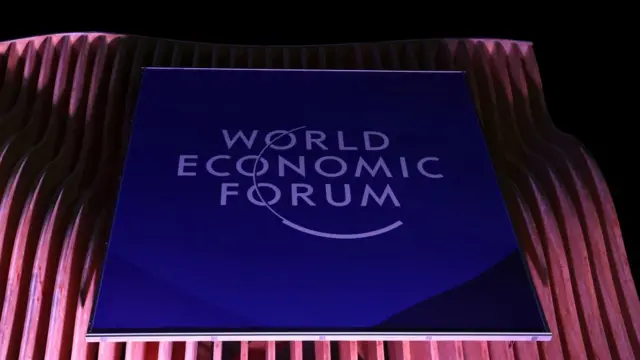 A logo of the World Economic Forum (WEF) sits outside near the Congress Center on the opening day of the 55th annual meeting of WEF in Davos