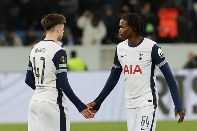 Callum Olusesi (R) celebrates with Tottenham Hotspur's English midfielder #47 Mikey Moore