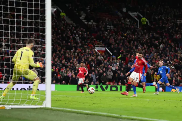 Bruno Fernandes of Manchester United scores the second goal during the UEFA Europa League 2024/25 League Phase MD7 match between Manchester United and Rangers FC at Old Trafford