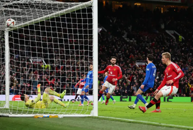 Bruno Fernandes of Manchester United scores the second goal during the UEFA Europa League 2024/25 League Phase MD7 match between Manchester United and Rangers FC at Old Trafford