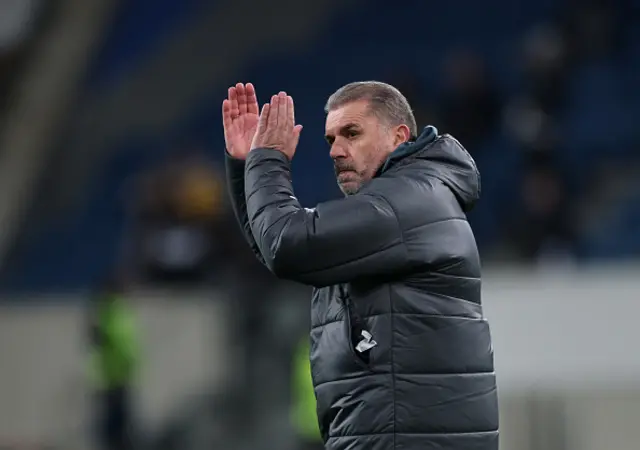 Ange Postecoglou, Manager of Tottenham Hotspur, applauds the fans